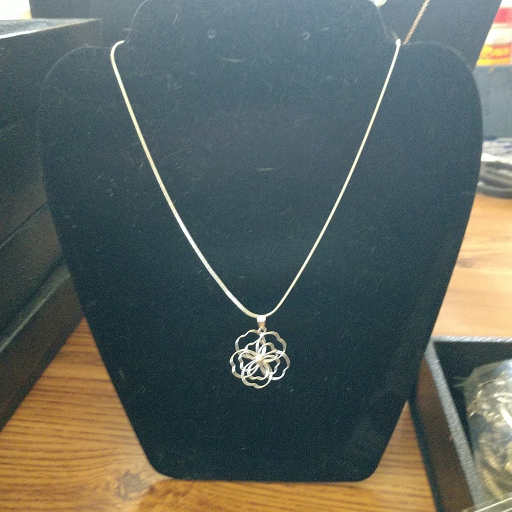 Ladies silver necklace and flower charm